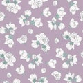 Seamless pattern of white flowers on a purple background